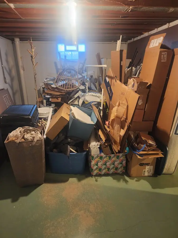 Roll-off dumpster container at job site for 2 Yard Dumpster Rental in East Bloomfield